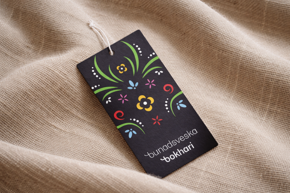 Bunadsveska på lin stoff